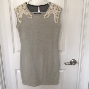 Bodycon dress with lace detailing on shoulders